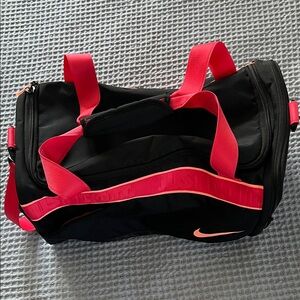 Nike sport bag. 16x10x10. Black, red, orange